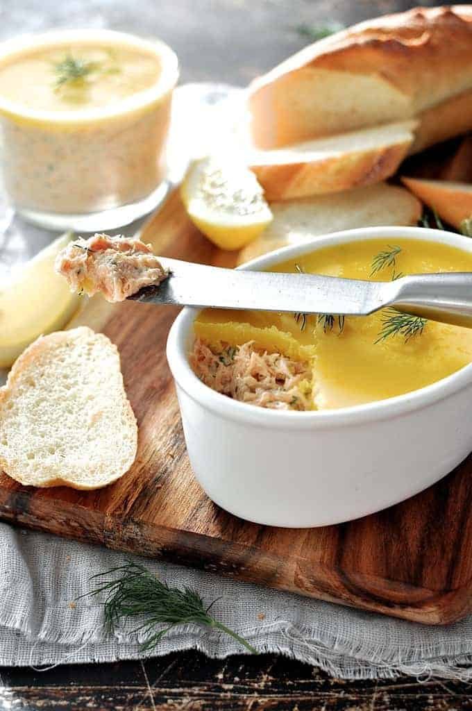 Elegant Smoked Trout Dip in a small white dish with bread on the side.