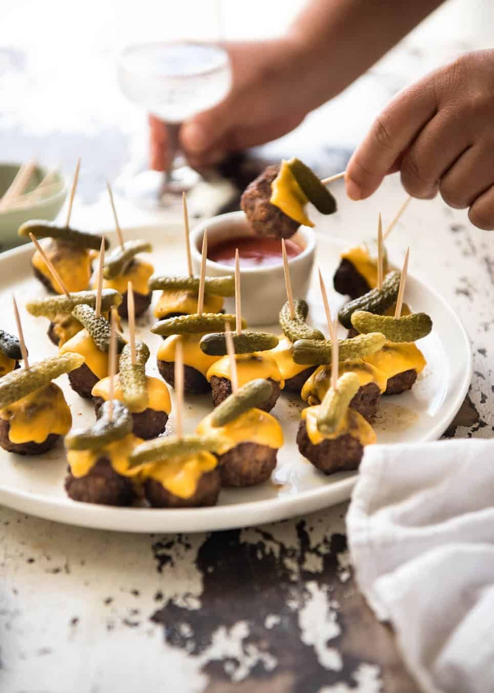 Cheeseburger Party Meatballs - tastes like a cheeseburger, in bite size form! Great for making ahead - fully assemble (inc toothpicks), 90 sec reheat in microwave. www.recipetineats.com
