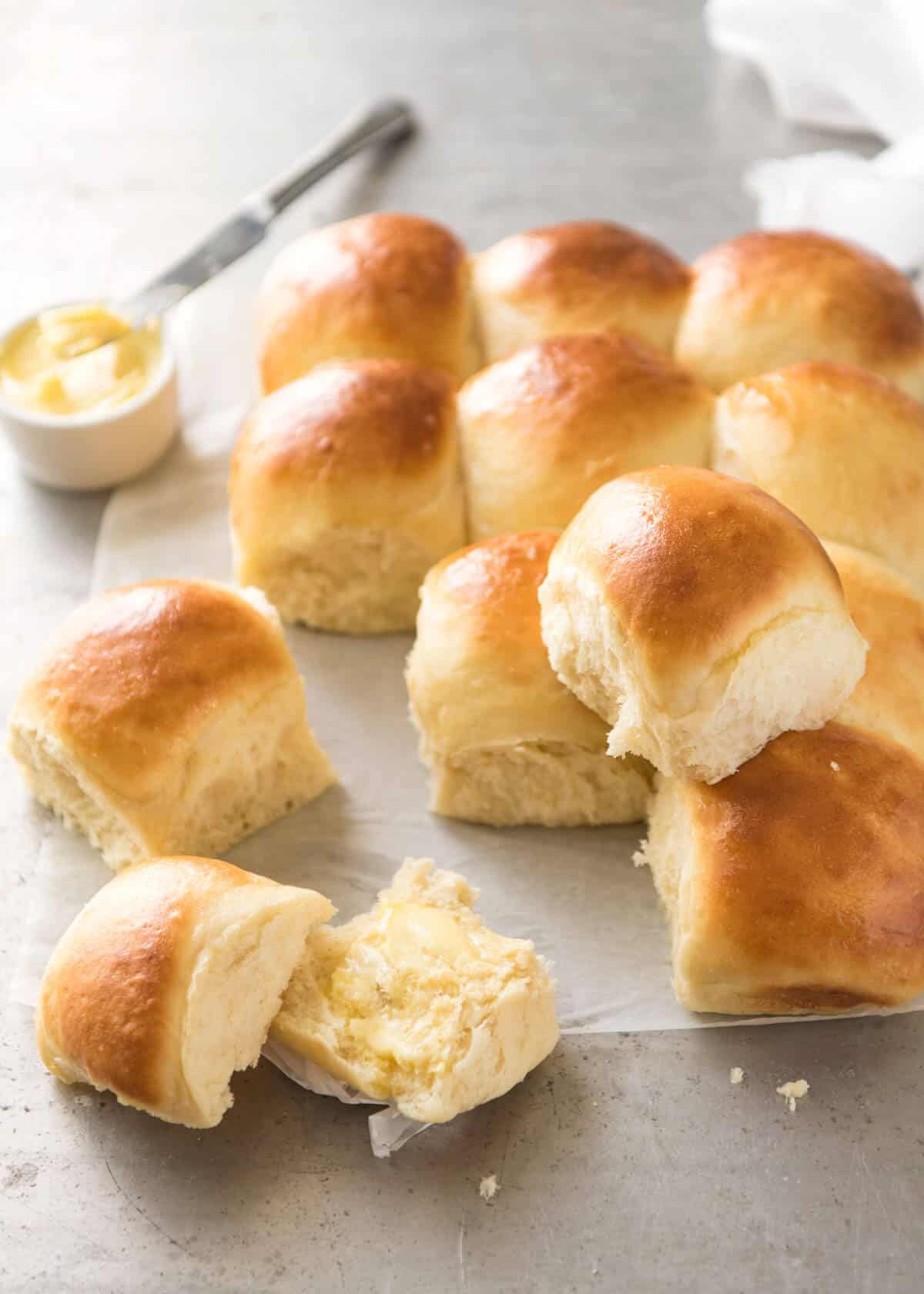 Soft no knead dinner rolls, fresh out of the oven, ready to be eaten.