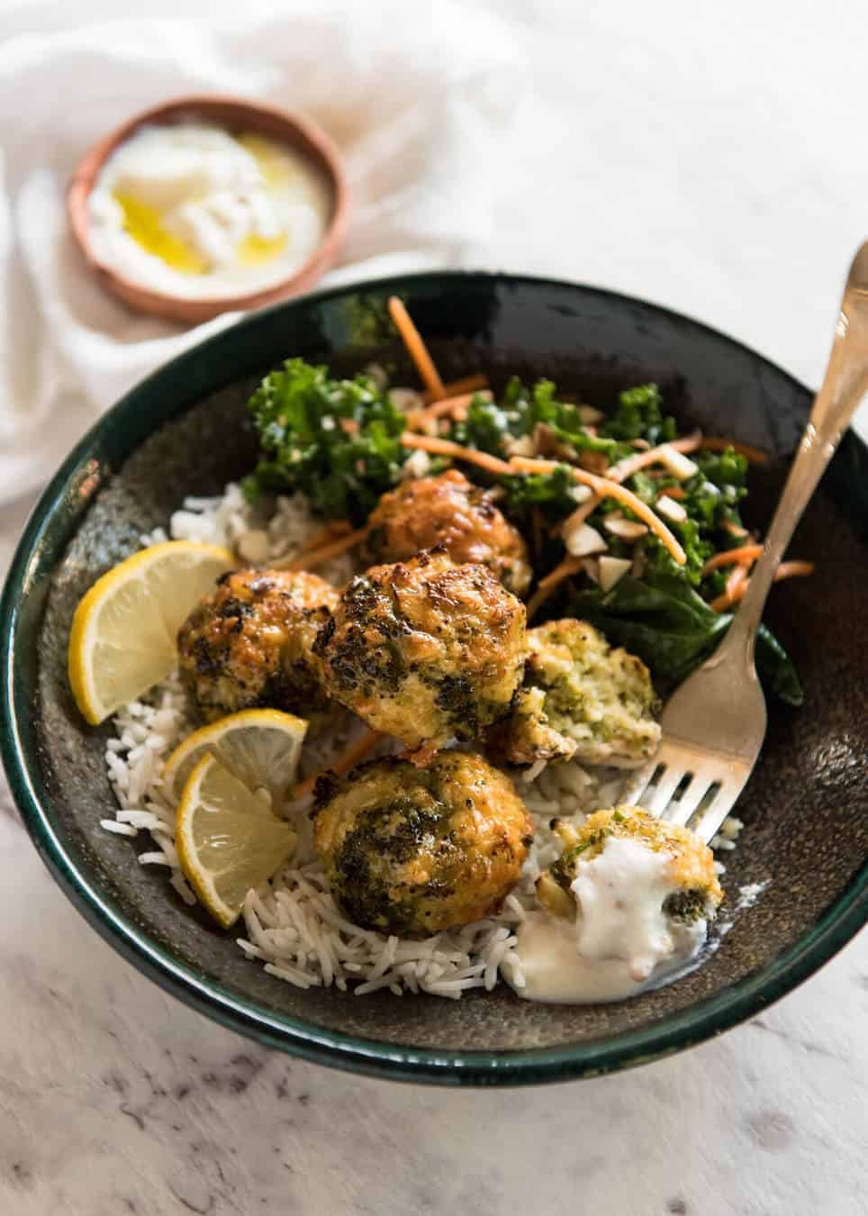 Baked Broccoli Cheese Balls - outrageously delicious as a meal or bites to serve at a gathering! Served with a Yoghurt Lemon Sauce. recipetineats.com