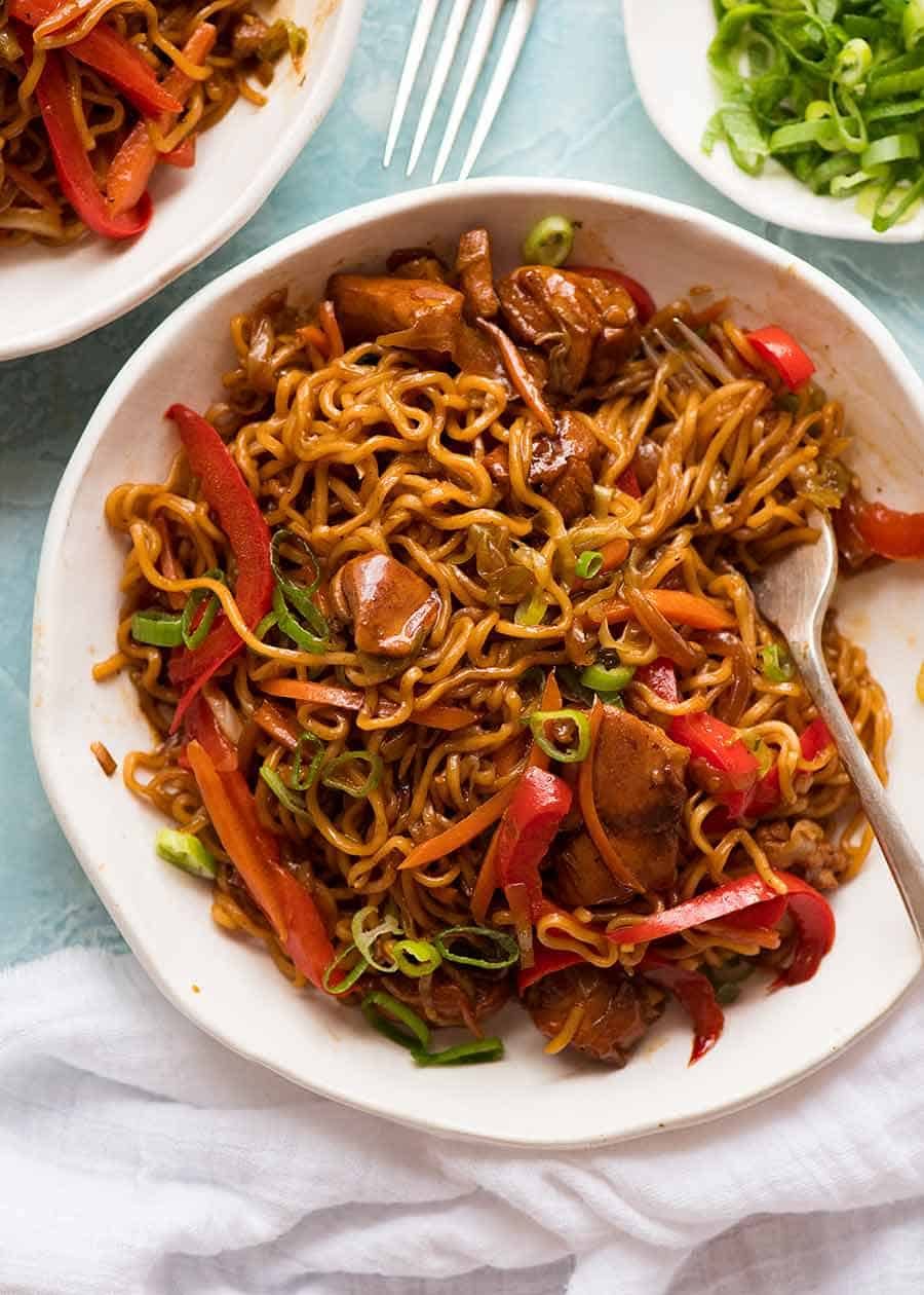 Overhead photo of Chicken Vegetable Ramen Noodles in a white bowl, ready to be eaten.