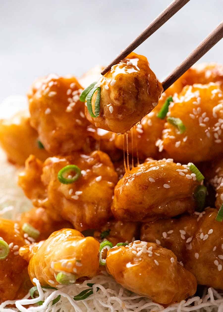 Chopsticks picking up crispy Honey Chicken - built to last!